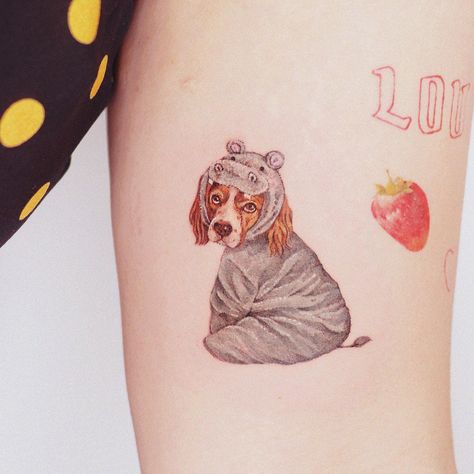 Kreskówkowe tatuaże z psem