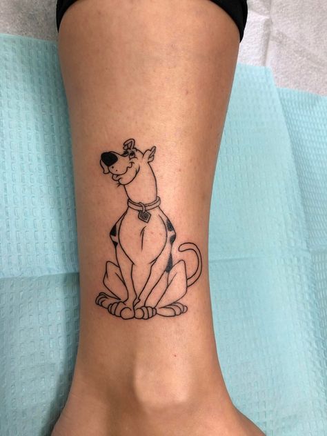 Kreskówkowe tatuaże z psem skubi du