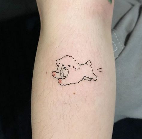 Kreskówkowy tatuaż z psem